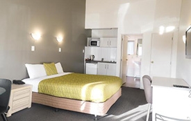 queen-size bed and LCD with Sky TV